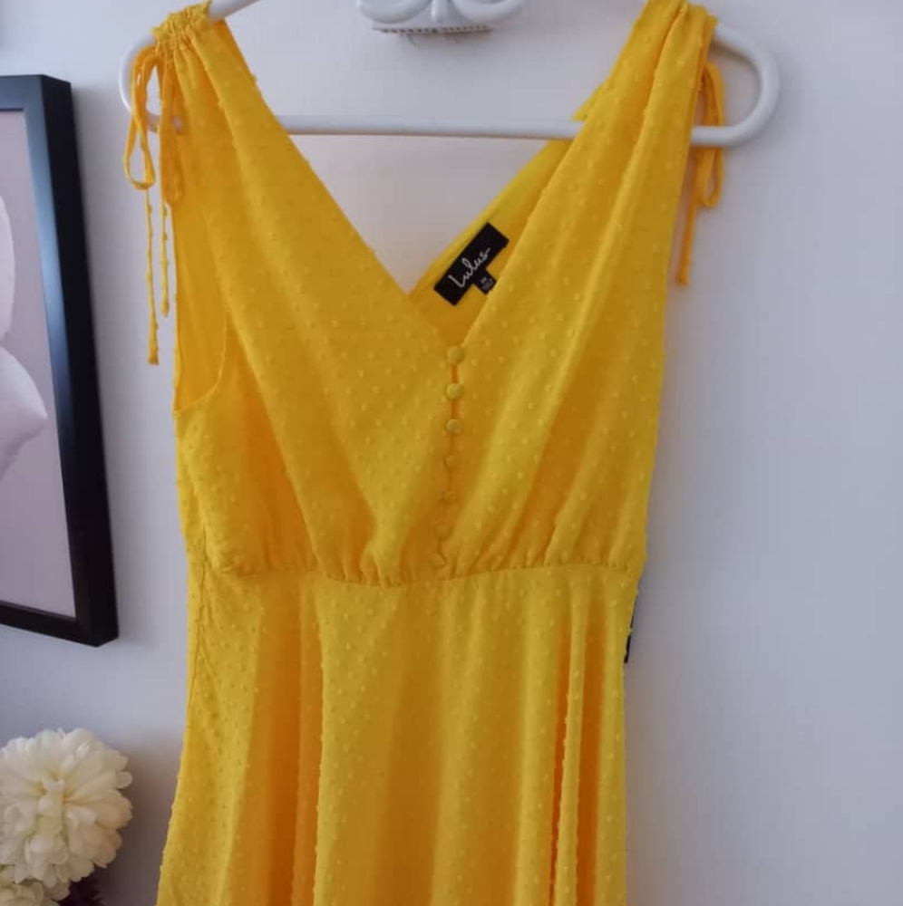 Beautiful New yellow dress with tags.